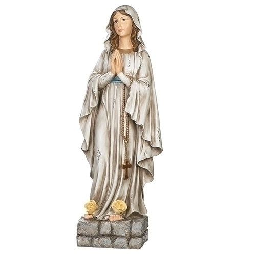 Our Lady of Lourdes antique statue 32 inches tall with detailed robes, praying hands, rosary, and floral base accents