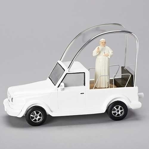 White and black musical Pope Mobile figurine with standing Pope Francis and protective silver arches, 6.75 inches tall.