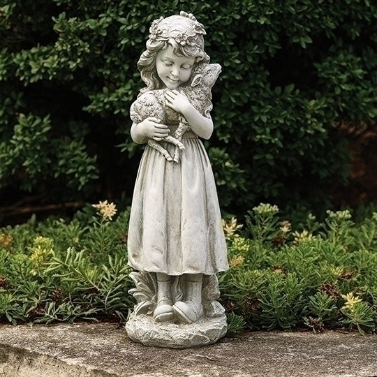 Girl garden statue 16"H holding a lamb, featuring detailed dress and floral wreath with serene expression.