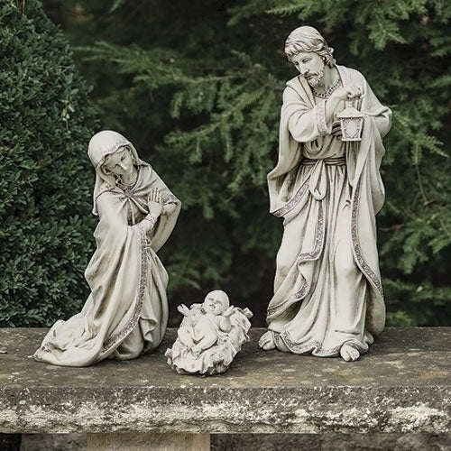 21" scale Holy Family garden figures set in pure white with detailed Mary, Joseph holding lantern, and baby Jesus in manger