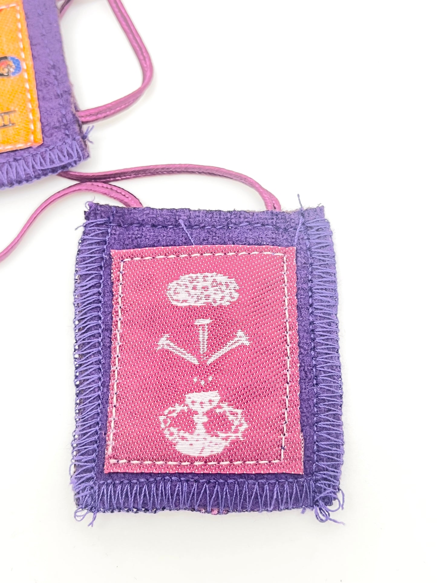 Purple Scapular with religious symbols, handcrafted fabric with stitched edges, size 2 by 1 3/4 inches.