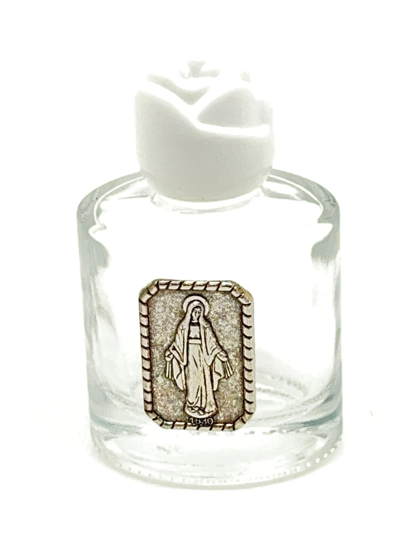 Clear glass holy water bottle 2.25 inches tall with Our Lady of Grace metal emblem and white cap stopper