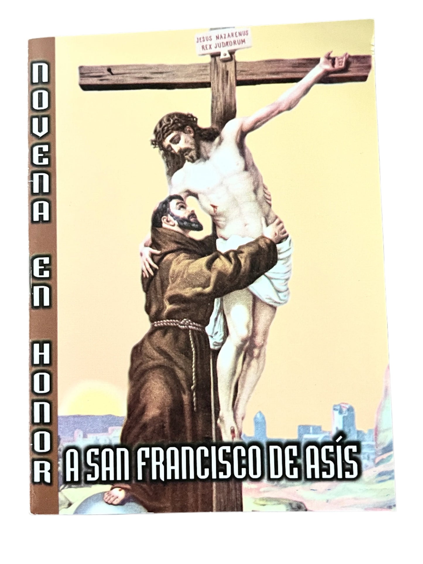 Prayer booklet titled Novena en Honor a San Francisco de Asis with religious artwork of Saint Francis and Jesus on the cross