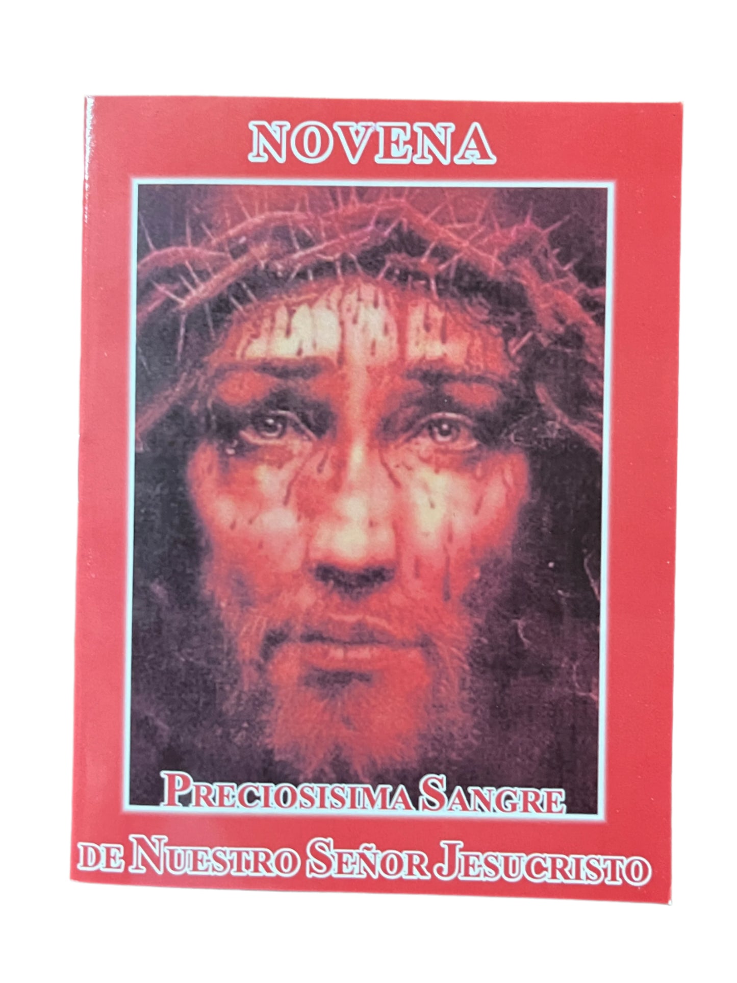Novena Preciosisima Sangre de Nuestro Senor Jesucristo booklet with portrait of Jesus wearing a crown of thorns on red cover