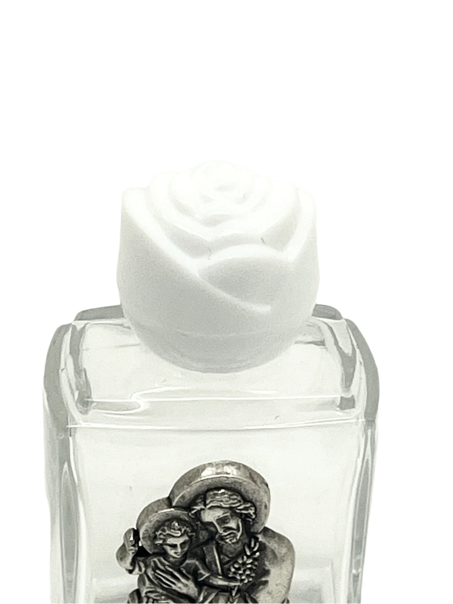 Small clear glass holy water bottle with pewter St. Joseph image and white rose-shaped cap