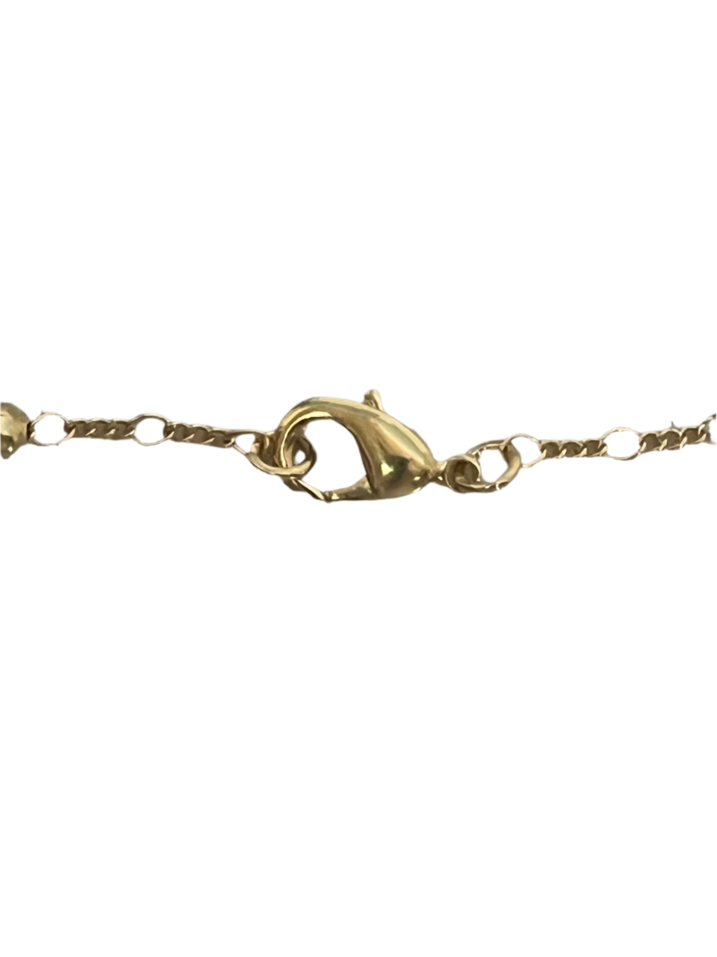 Close-up of gold lobster clasp on delicate 4 mm chain from Gold Our Lady of Grace necklace