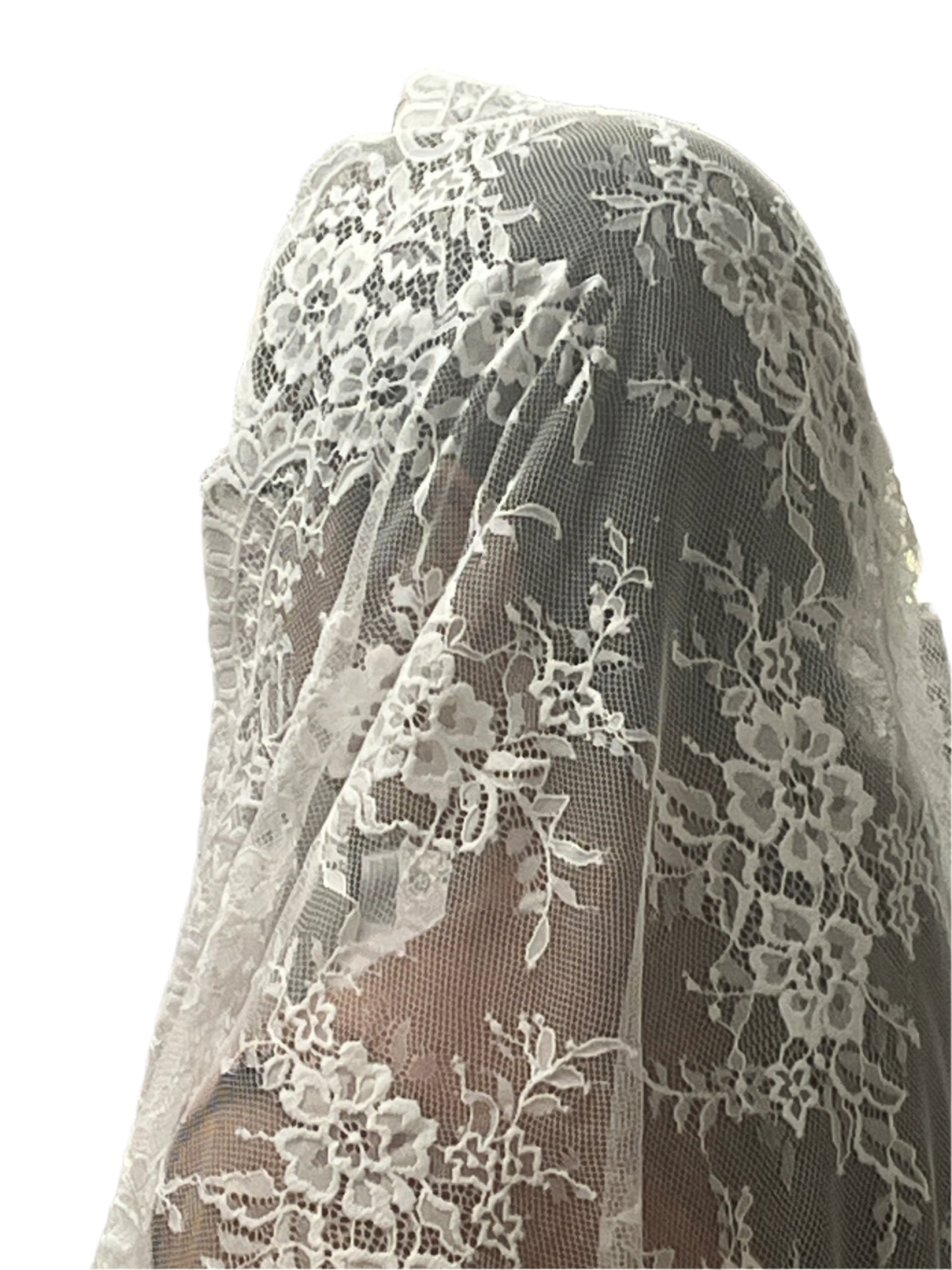 61" white Gabriela half circle lace mantilla veil with delicate floral motifs and scalloped edges over model's head