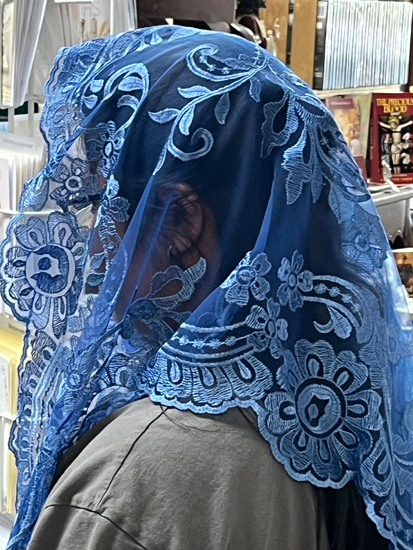 Arabic blue lace mantilla chapel veil with floral motifs and scalloped edges, 51 inches long, worn over head and shoulders