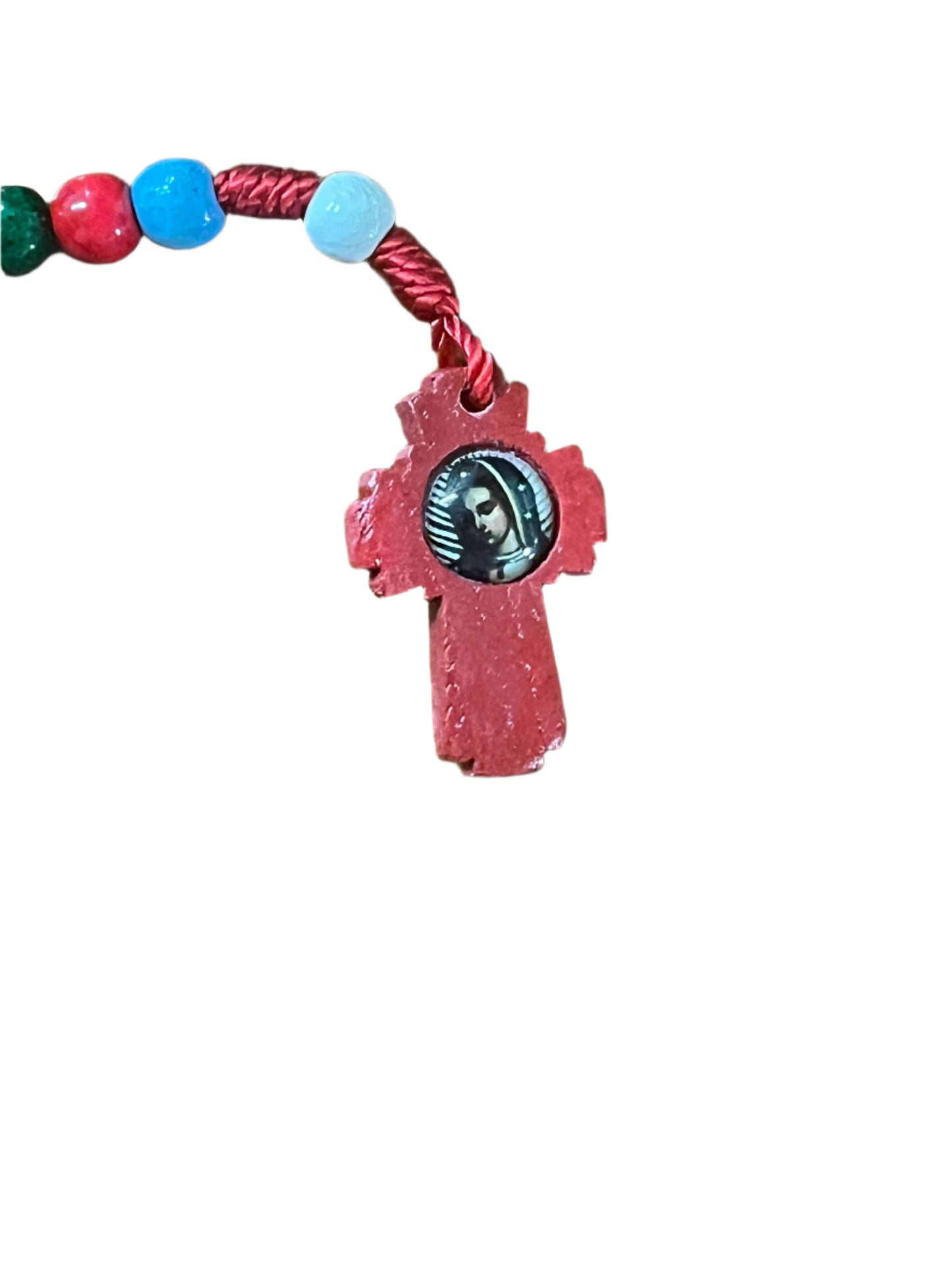 red wooden missionary rosary cross with Our Lady of Guadalupe image and multicolored beads on red cord