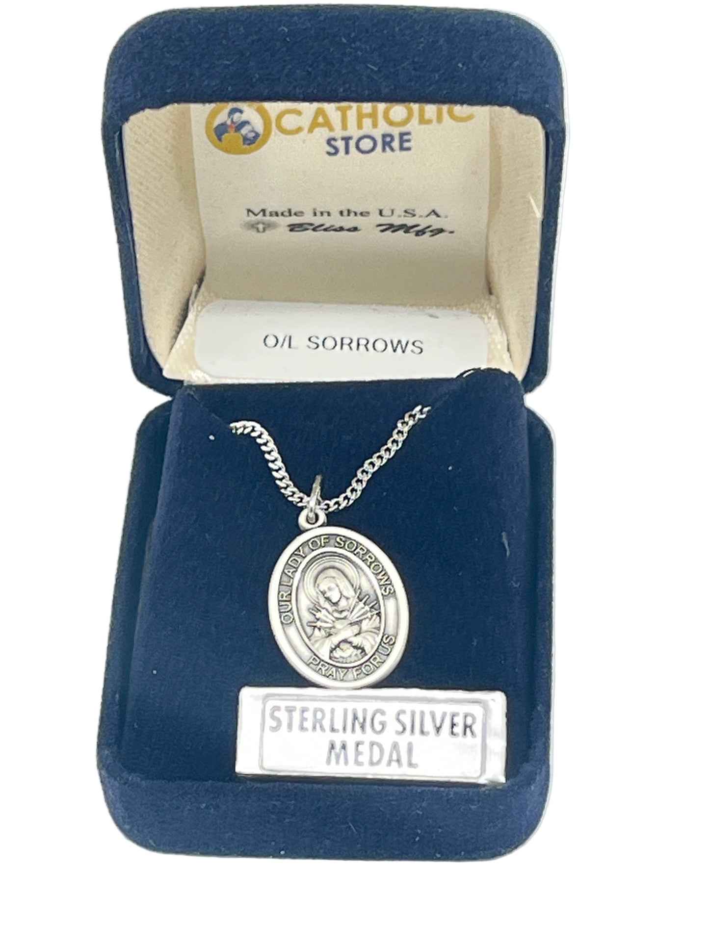 3/4" Our Lady of Sorrows sterling silver oval medal pendant on 18" rhodium curb chain in blue velvet box