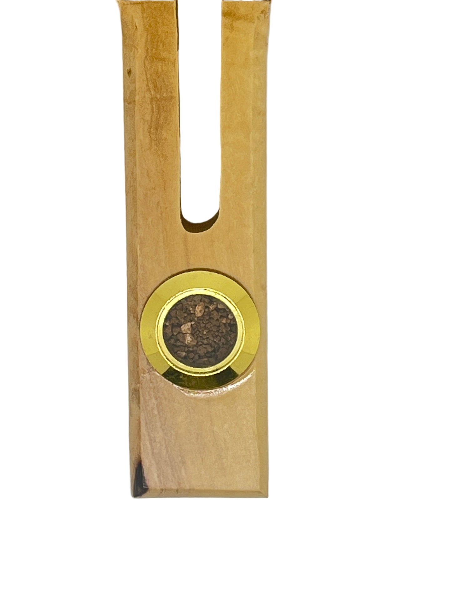 Bethlehem olive wood holder with gold circular reliquary containing holy soil fragment on white background