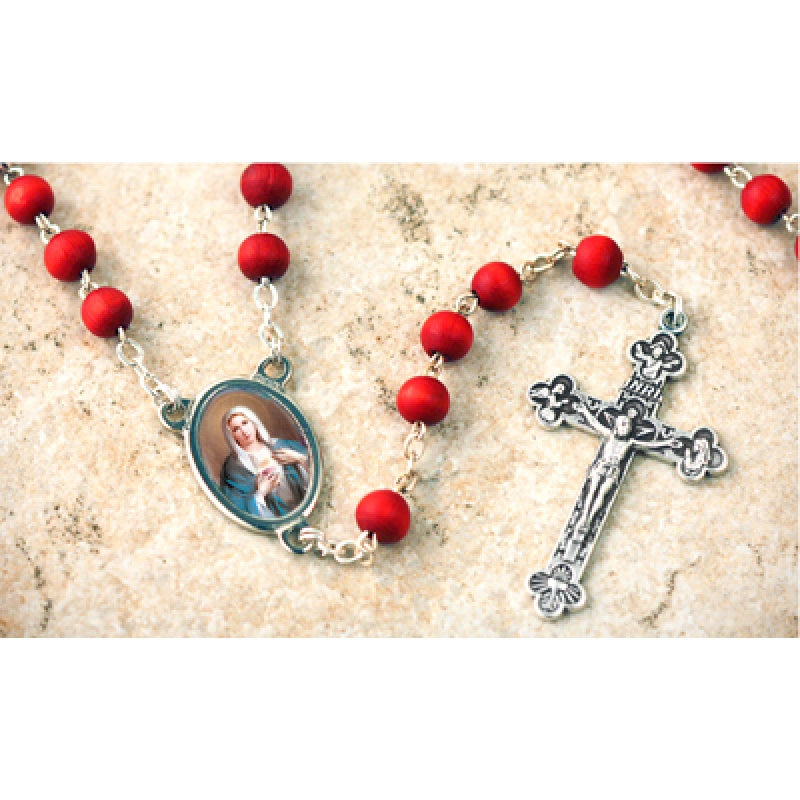 Immaculate Heart of Mary scented rosary with red beads, silver crucifix, and oval medal featuring Mary’s image
