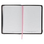 Midnight botanical faux leather journal open to lined pages with pink ribbon bookmark and zipper closure