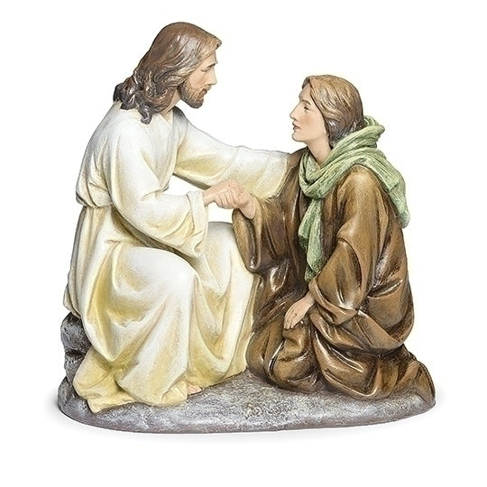 7" Jesus the Comforting Healer figure hand-painted with gentle expression, flowing robes, and kneeling woman on stone base