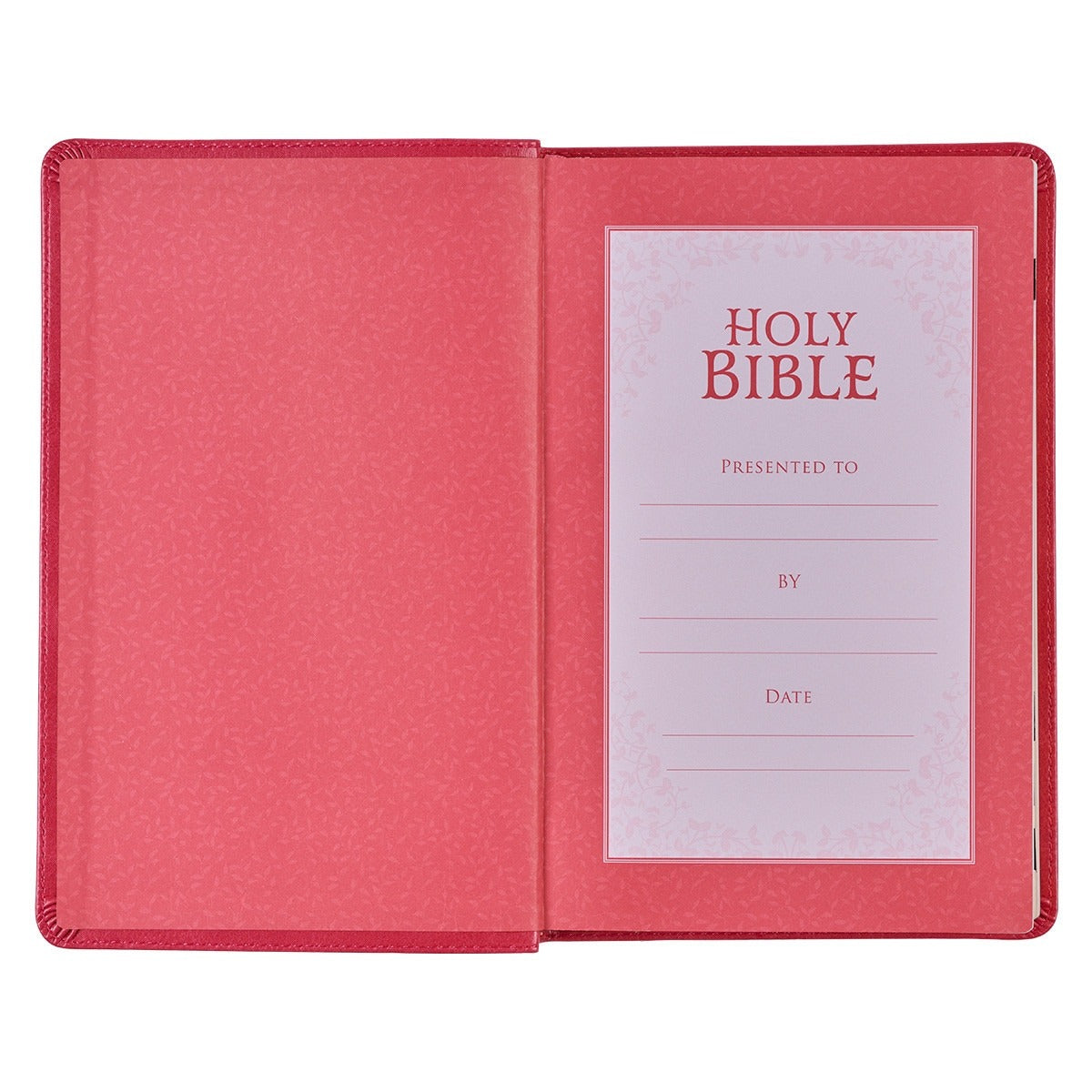 Open pink faux leather King James Version Deluxe Gift Bible showing personalized presentation page with decorative border