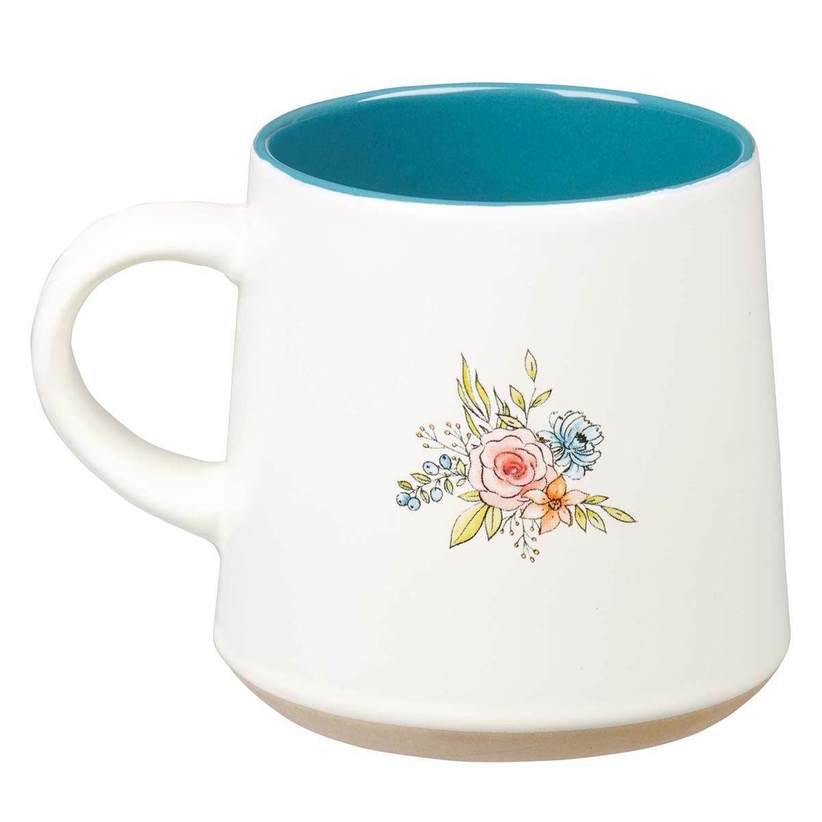 White ceramic Grandma coffee mug with floral design, blue interior, and clay dipped base on white background