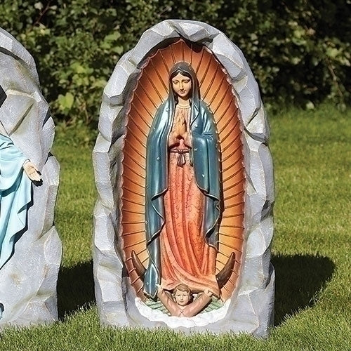 36" Our Lady of Guadalupe garden statue in grotto with hand-painted vibrant colors on outdoor grass background