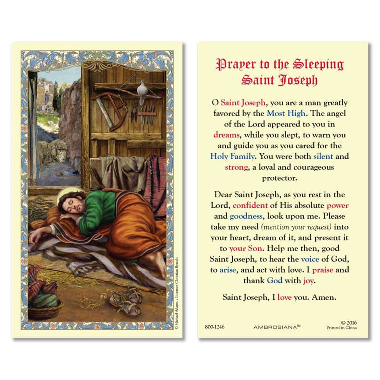 Laminated holy card featuring Sleeping Saint Joseph with prayer on back, ornate border and detailed workshop background.