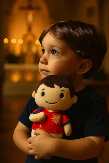 Child holding Saint Carlo Acutis plush doll wearing red shirt with sun emblem in softly lit church background