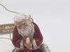 Kneeling Santa Claus with Baby Jesus Ornament - Unique Catholic Gifts