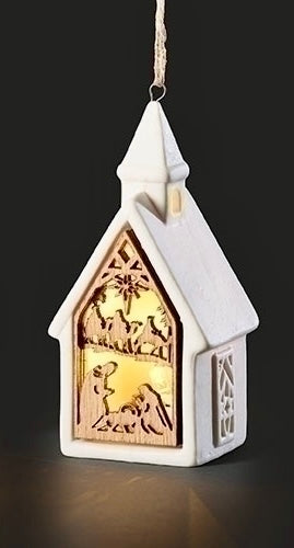 4.7" lighted church nativity ornament with stone resin construction and warm glowing Christmas scene inside window