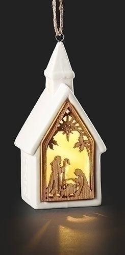4.7" lighted church nativity ornament with stone resin frame and warm glowing Holy Family scene inside window
