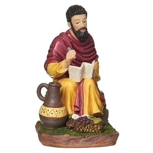 3-inch St. Matthew the Evangelist statue seated reading book with traditional robes, clay jug, and basket of fruit on base.