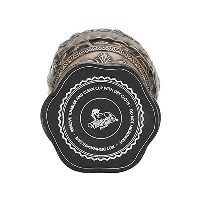 6 3/4" Last Supper chalice cup with antique bronze finish and embossed decorative base label detailing care instructions