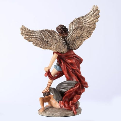 6 3/8" hand-painted St. Michael statue with gold wings, red robe, standing on defeated demon on stone base