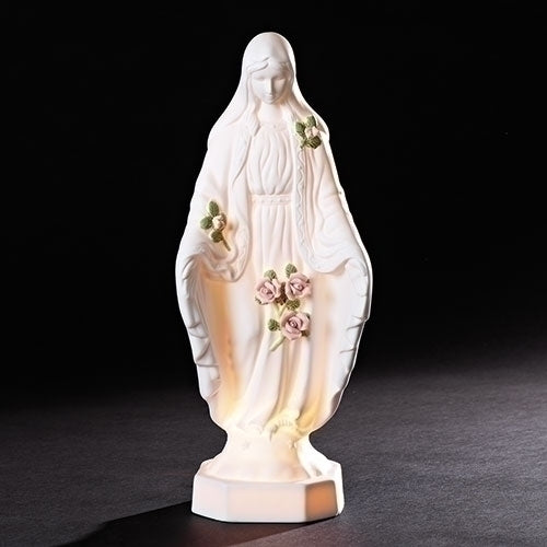 Our Lady of Grace night light with delicate pink roses and green leaves, emitting a gentle warm glow, 12 inches tall