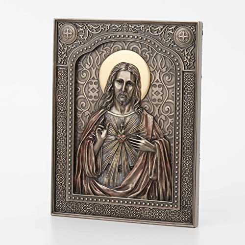 7 1/2" bronze-finished resin wall plaque of the Sacred Heart of Jesus with detailed halo and ornate border design