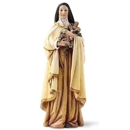 St. Therese figurine 6.25 inches tall holding roses and a cross, featuring detailed robes and serene expression