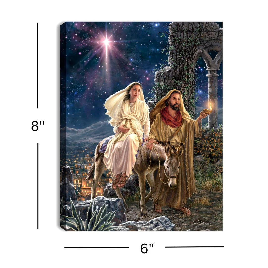 Lighted 8x6" tabletop canvas of Joseph and Mary journeying to Bethlehem with bright star in night sky