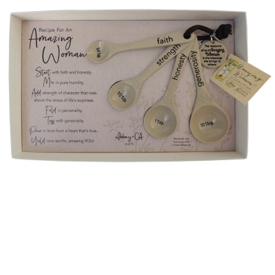 Set of four silver ox finish measuring spoons with faith, strength, honesty, and generosity engraved, in decorative box