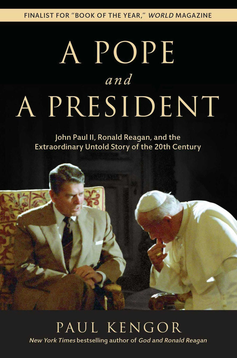 Book cover of A Pope and a President by Paul Kengor featuring John Paul II and Ronald Reagan discussing history