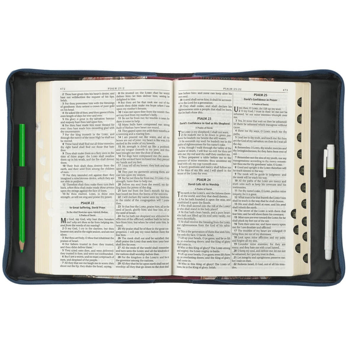 Large peacock blue faux leather Bible cover open to show inside storage pockets and tabs on Bible pages