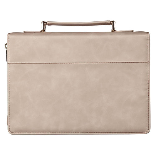 Large taupe faux leather Bible cover with handle, smooth texture, and secure zipper closure for protection and style