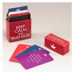 Red box of blessings titled Keep Calm and Trust God with inspirational palm-sized cards spread on white background