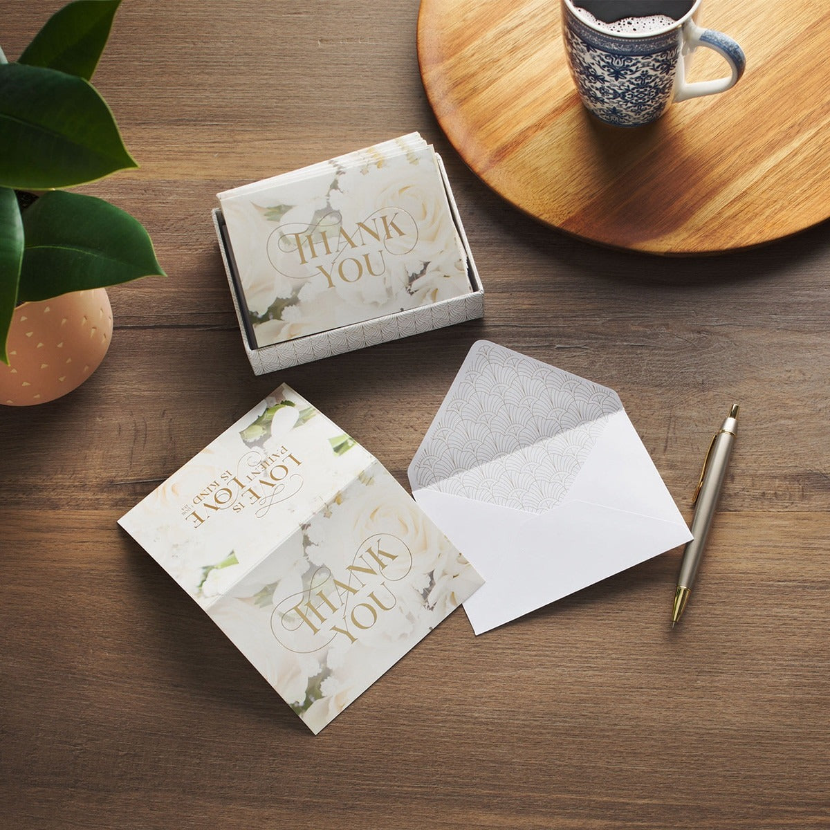 Ivory Rose Wedding Thank You note cards with gold lettering, white envelopes, and soft floral marble design in gift box