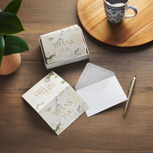 Ivory Rose Wedding Thank You note cards with gold lettering, white envelopes, and soft floral marble design in gift box