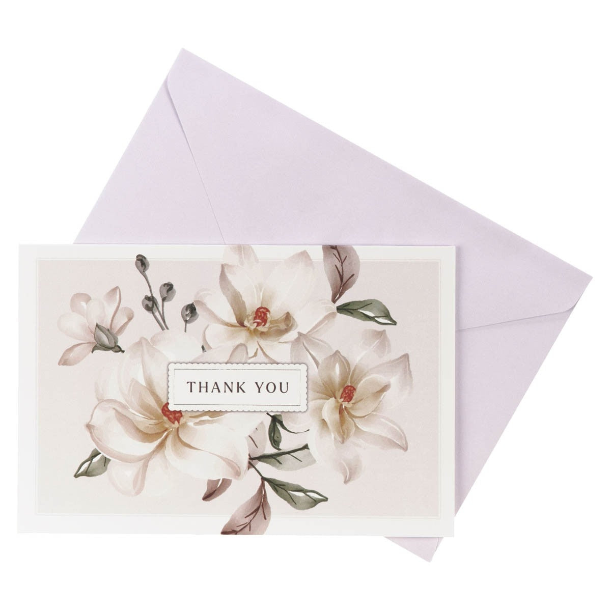 White magnolia thank you note card with delicate blossoms and soft green leaves, shown with light lavender envelope