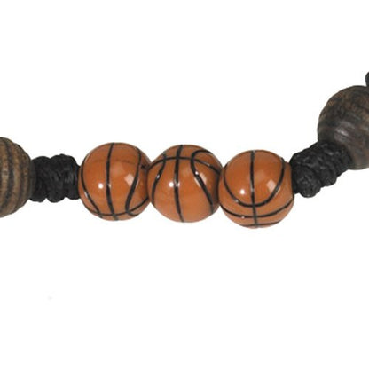 Close-up of basketball-themed rosary beads with orange basketball design and black cord threading
