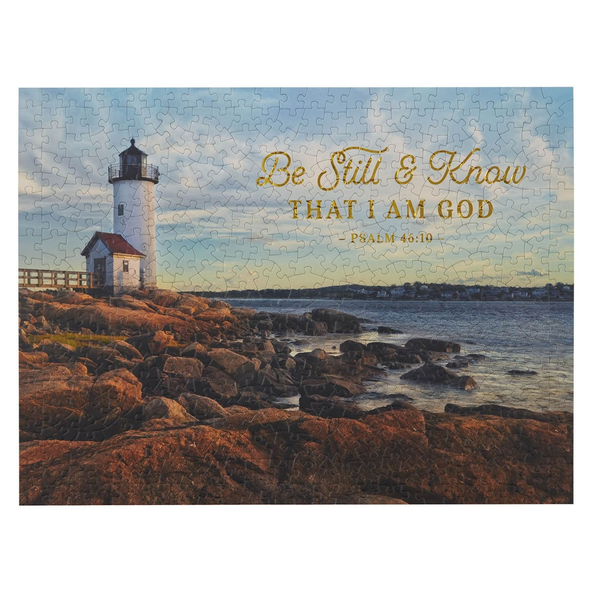 500-piece jigsaw puzzle featuring lighthouse on rocky shore with Psalm 46:10 "Be Still & Know That I Am God" text