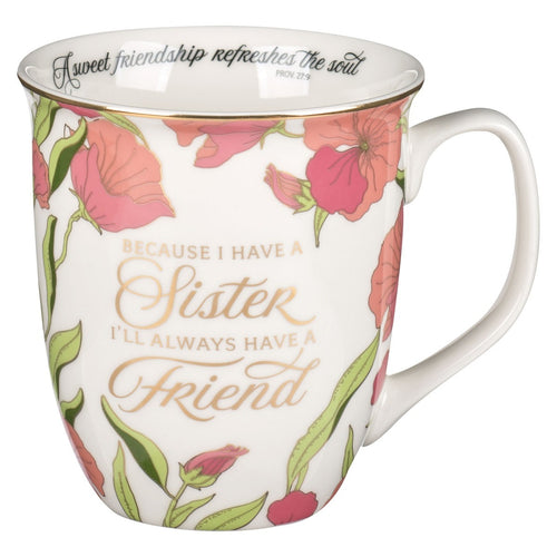Ceramic coffee mug with pink floral design and Proverbs 27:9 quote celebrating sisterhood and friendship bond