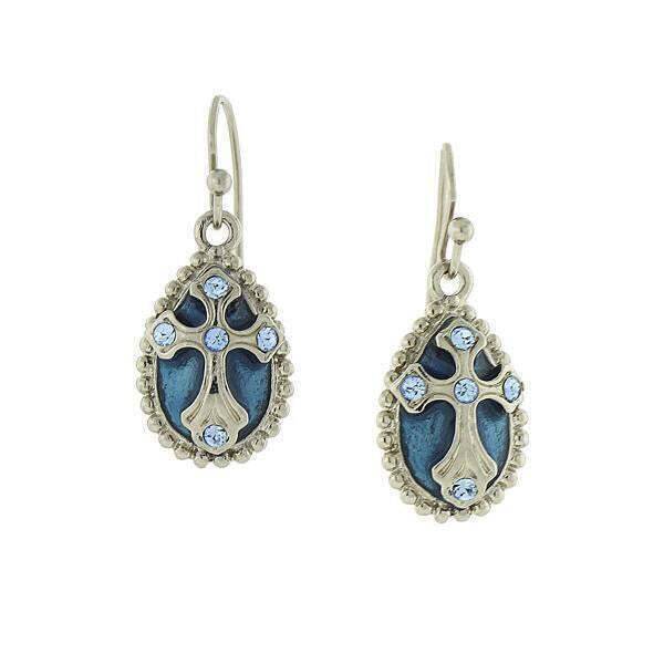 Silver tone teardrop earrings with blue enamel background and light blue crystal cross accents