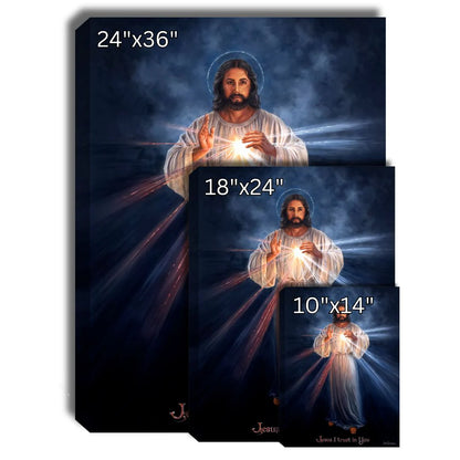 Divine Mercy Canvas Wall Art 10x14" featuring Jesus in white robes with radiant light and halo on dark background