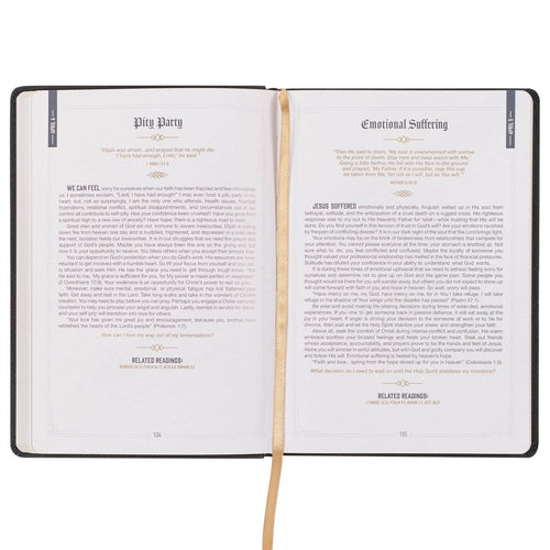 Open Pursuing God Saddle Tan Faux Leather Devotional showing large print daily readings with gold ribbon marker