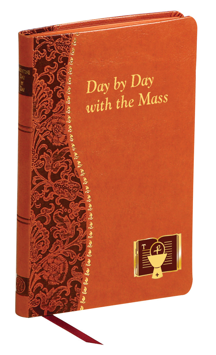 Hardcover "Day by Day with the Mass" book with decorative spine and gold-embossed religious symbols on cover