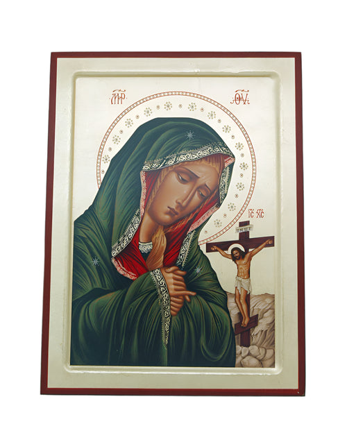 Greek hand-painted serigraph depicting the Virgin Mary in green robe with the crucifixion of Jesus in the background