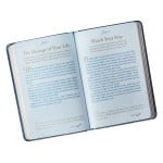 7" x 5" Mr. & Mrs. 366 Devotions for Couples book with blue faux leather cover and white interior pages open to text passages
